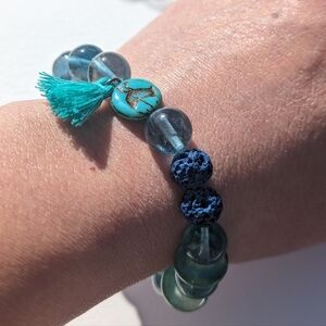 Birdie tassel essential oil diffuser blue stone bracelet